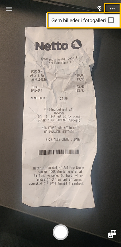 Viser scanning af en kvittering i e-conomic mobilappen – bruges til at uploade et bilag til regnskabet.