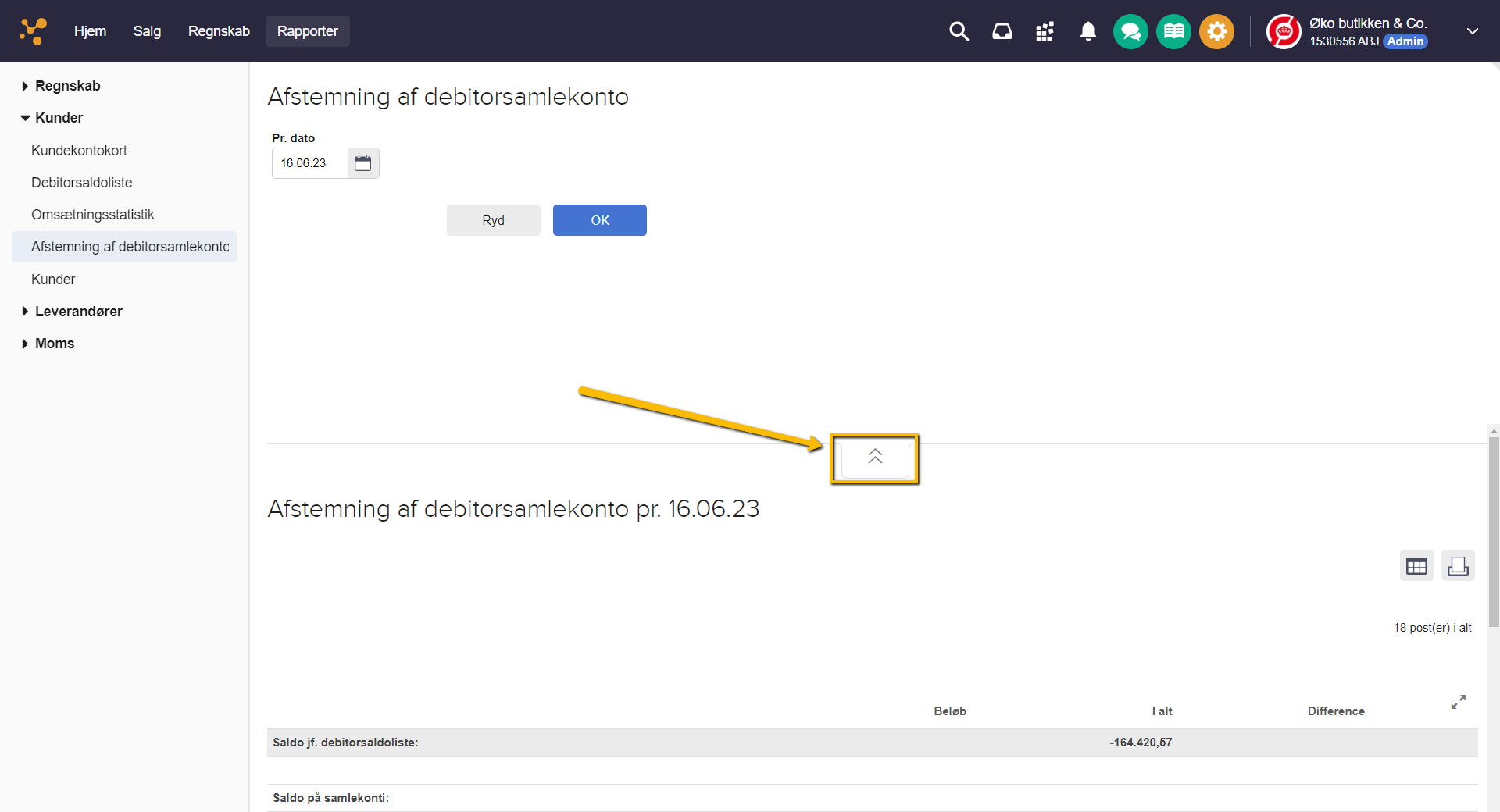 Viser ikonet med to pile op i rapporten Afstemning af debitorsamlekonto – bruges til at vise søgeområdet igen.